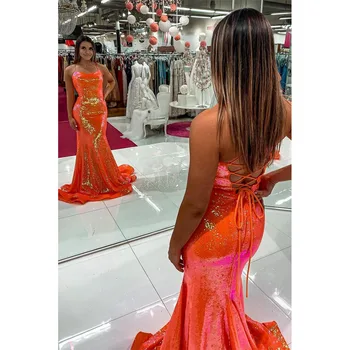 Блестящее оранжевое вечернее платье с пайетками 